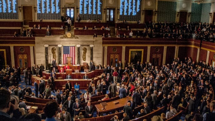 Washington, DC., USA, January 3, 2017 Members of the 115th congress and their familes mingle on the house floor while attending the joint session on the opening day of the current session.