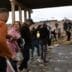 Juarez, Mexico, 11-15-2022: Venezuelan migrants cross the Rio Grande to surrender to the border patrol with the intention of requesting asylum in the United States.