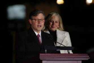 WASHINGTON, DC - November 28, 2023: House Speaker Mike Johnson (R-La.) speaks at the lighting of the Capitol Christmas Tree alongside his wife, Kelly Johnson.