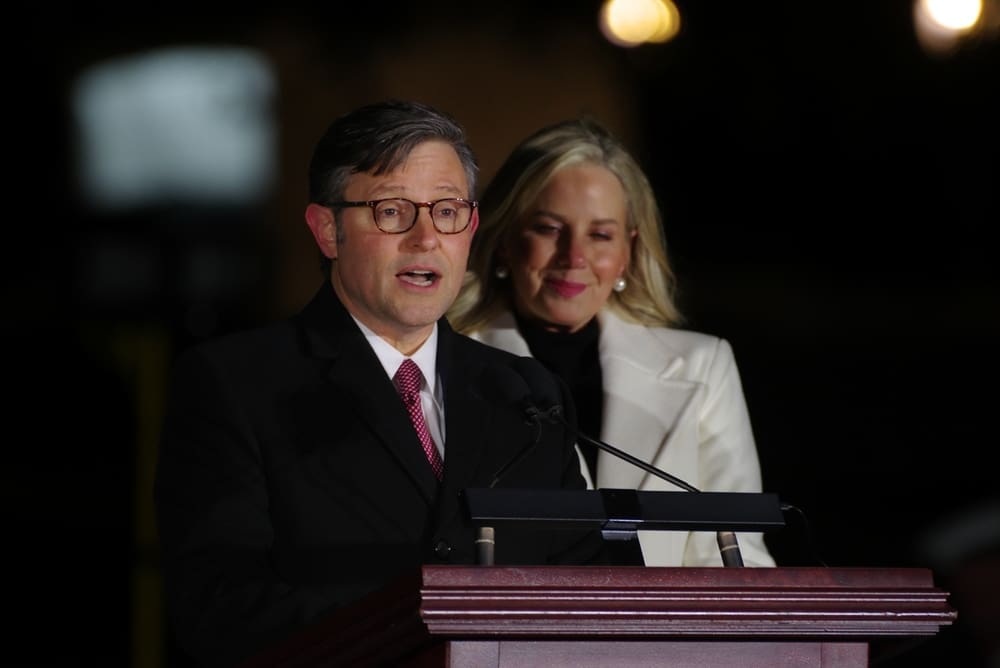 WASHINGTON, DC - November 28, 2023: House Speaker Mike Johnson (R-La.) speaks at the lighting of the Capitol Christmas Tree alongside his wife, Kelly Johnson.