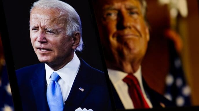 Democratic candidate Joe Biden is sharp in the foreground, while Republican candidate Donald Trump is blurred in the background, USA, December 16, 2024