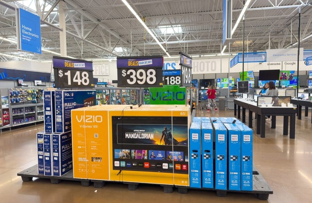 Los Angeles, CA - Dec 17, 2023: Vizio and TCL flat panel televisions on display in center of an isle at Walmart store.