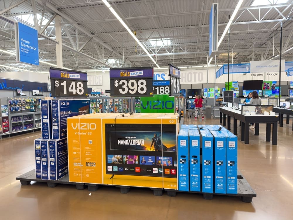 Los Angeles, CA - Dec 17, 2023: Vizio and TCL flat panel televisions on display in center of an isle at Walmart store.