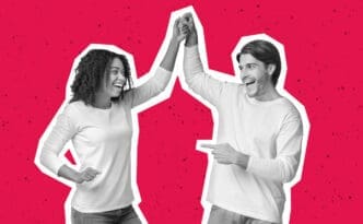 A stylized, black and white photo of an excited man and woman giving each other a high-five, presented with a white cutout border against a solid red background.