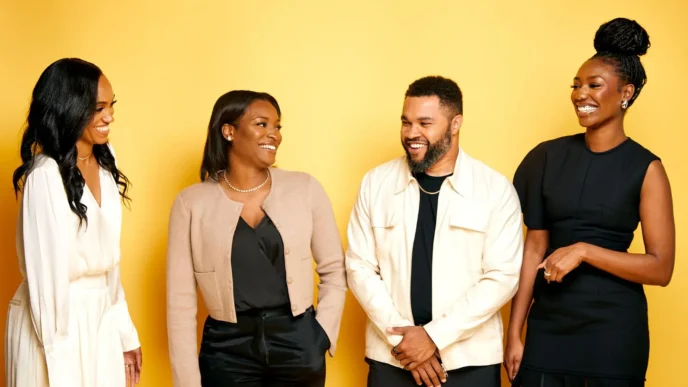 A professional group photo of the Collab Capital team, featuring Managing Partners Barry Givens and Jewel Burks Solomon, alongside Senior Investment Associate Baheejah Crumbley and Investment Associate Sydney Holness.