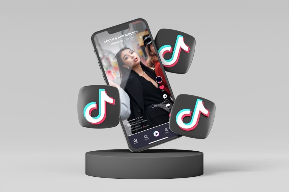 A smartphone displaying a social media app's video feed is shown floating above a dark cylindrical base, with three stylized musical note icons (TikTok logos) floating around it, all against a plain grey background.