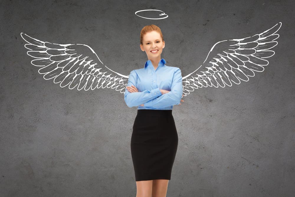 A smiling young businesswoman in professional attire is depicted with a conceptual overlay, such as a glowing shield icon, representing business and personal security.