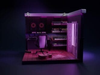 A miniature 3D music studio features synthesizers, a guitar, and creative purple lighting.