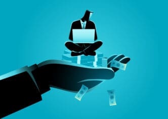 A large, dark silhouette of a hand extends forward, holding a smaller, silhouetted businessman sitting cross-legged on stacks of money, working on a laptop, against a vibrant blue background with falling money.