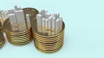 3D render of stacks of golden coins with city skyscrapers built on top of them, representing asset growth.