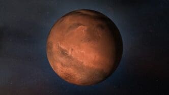 A detailed rendering of the planet Mars with its reddish, cratered surface, set against a dark starry background.