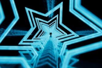 A tunnel of glowing star patterns stretches across a black background.