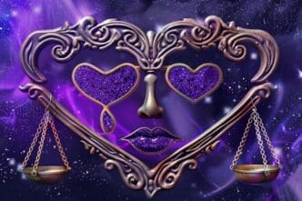 Two astrological symbols, a crab and a set of scales, representing Cancer and Libra, respectively.