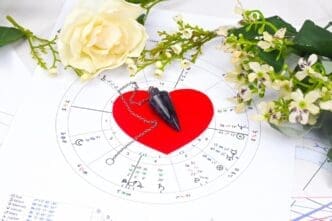 A white circle features a red heart in the center and a smaller red heart above it.