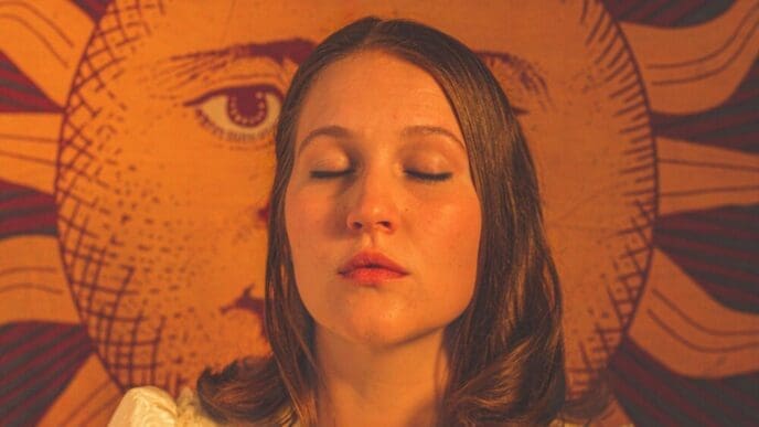 Close-up photograph of a young woman.
