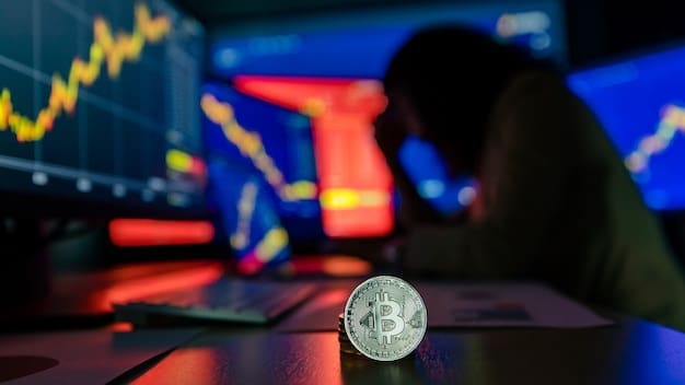 A silver Bitcoin coin stands upright on a desk in the foreground. In the blurred background, multiple computer monitors display volatile financial charts, and an upset trader is slumped over their desk, symbolizing market panic.