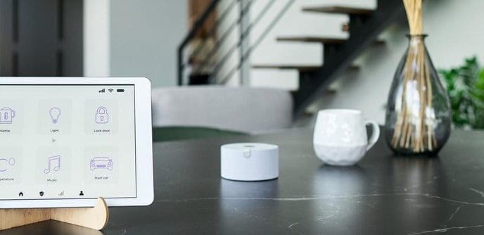 Tablet screen displaying a smart home control interface with various icons and settings.