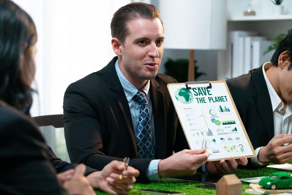 A diverse group of businesspeople collaborates on marketing strategies, emphasizing environmental responsibility and sustainable practices.