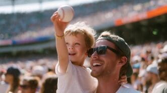 A diverse group of people, including family and friends, enjoy a sunny afternoon together at a baseball game in a stadium.