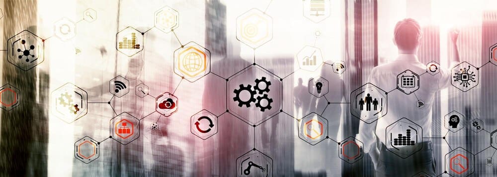 Abstract illustration of interconnected gears representing engineering, manufacturing, automation, and innovation.