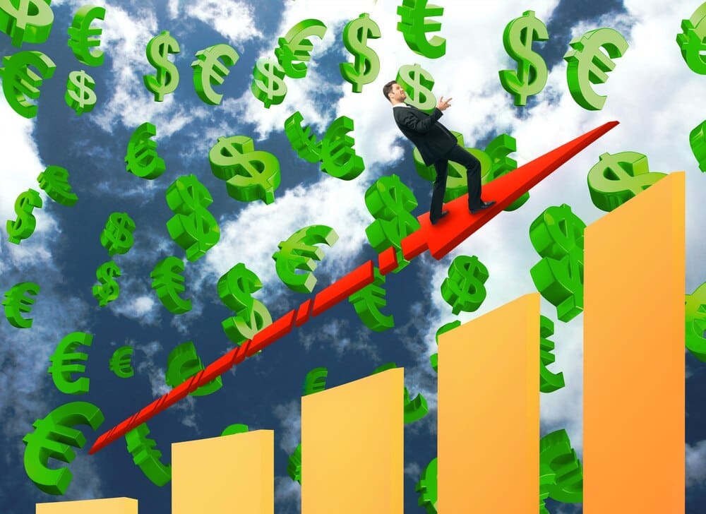 A graph shows a line trending upward, representing increasing sales.