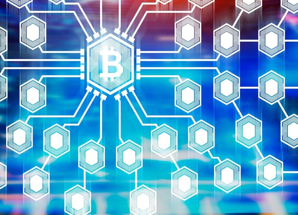 Large, glowing bitcoin symbol at the center of a network with a blurred blue and purple background, representing cryptocurrency and the future.