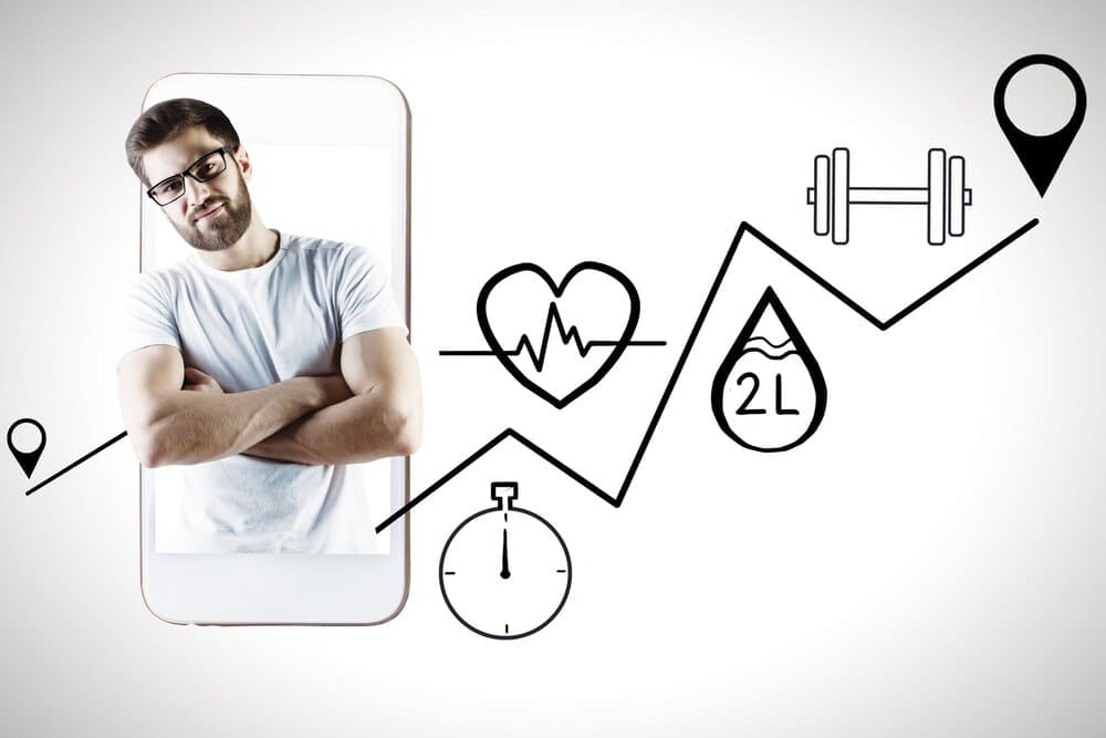 A man looks at a smartphone displaying a health app.