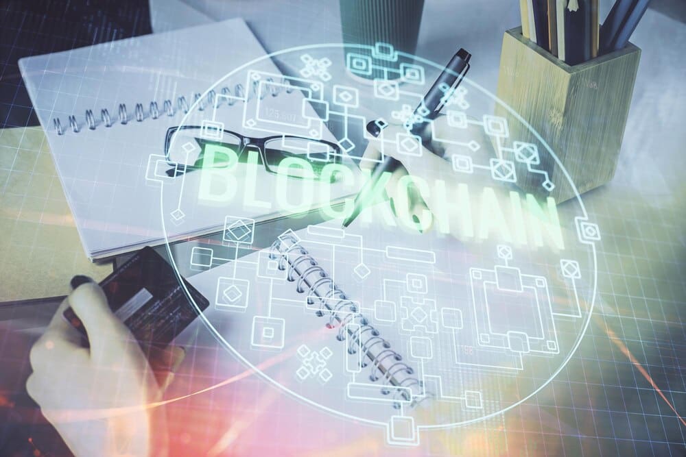 A woman holding a credit card is overlaid with a multi-exposure graphic featuring online shopping, blockchain, and e-commerce elements.