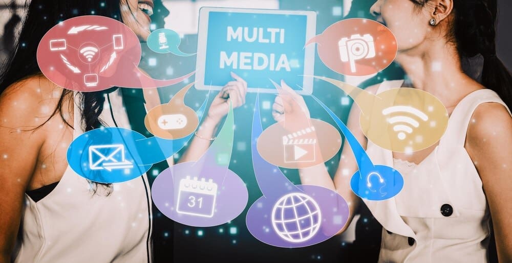 A colorful graphic depicts interconnected icons representing multimedia and computer applications.