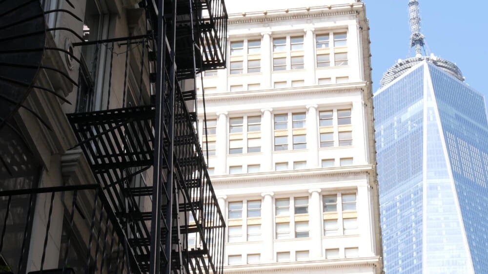 View of the New York City Financial District, including the World Trade Center, from Fulton Street.