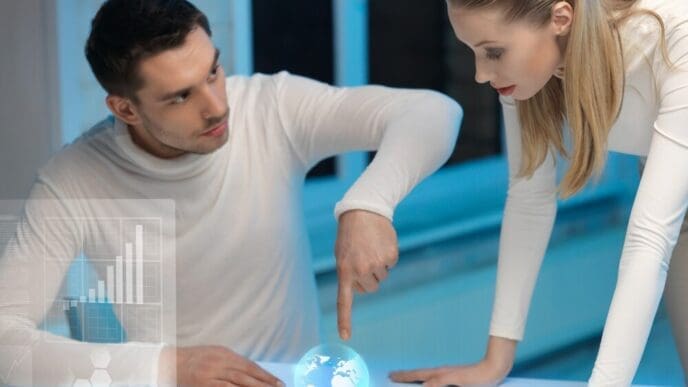 A man and a woman collaborate, interacting with multiple virtual screens displayed in front of them.