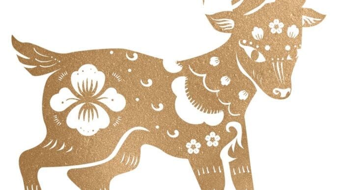 Illustration of a golden goat, representing the Chinese zodiac sign for the new year.