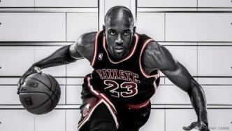 A professional basketball player dribbles a ball while training, isolated against a white background.