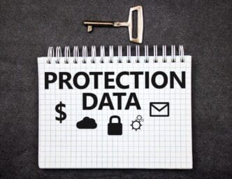 A conceptual image depicts a lock protecting data, correspondence, and finances within a cloud setting.