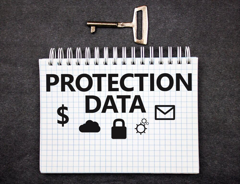 A conceptual image depicts a lock protecting data, correspondence, and finances within a cloud setting.