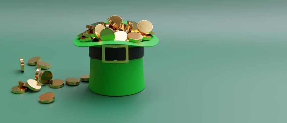 A three-dimensional rendering shows a green leprechaun hat overflowing with golden coins, symbolizing fortune and good luck for Saint Patrick's Day.