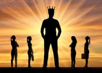 Silhouette of a large man wearing a crown stands prominently, with four smaller women positioned near him, representing gender inequality.