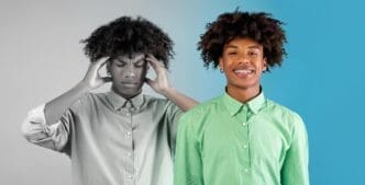 A Black millennial man with a pained expression covers his ears, likely experiencing a headache or distress.