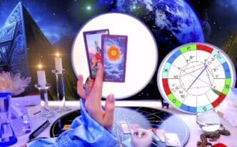 A person's hands are shown holding a tarot card during a fortune-telling session.