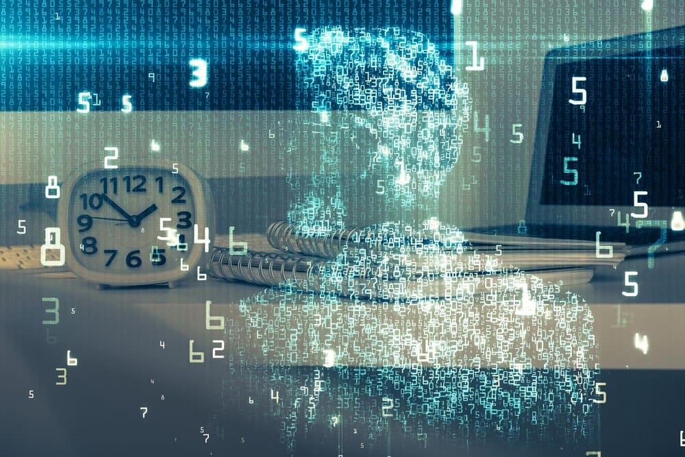 A multi-exposure image depicts a workspace with a computer and overlaid technology-themed drawings, symbolizing innovation.