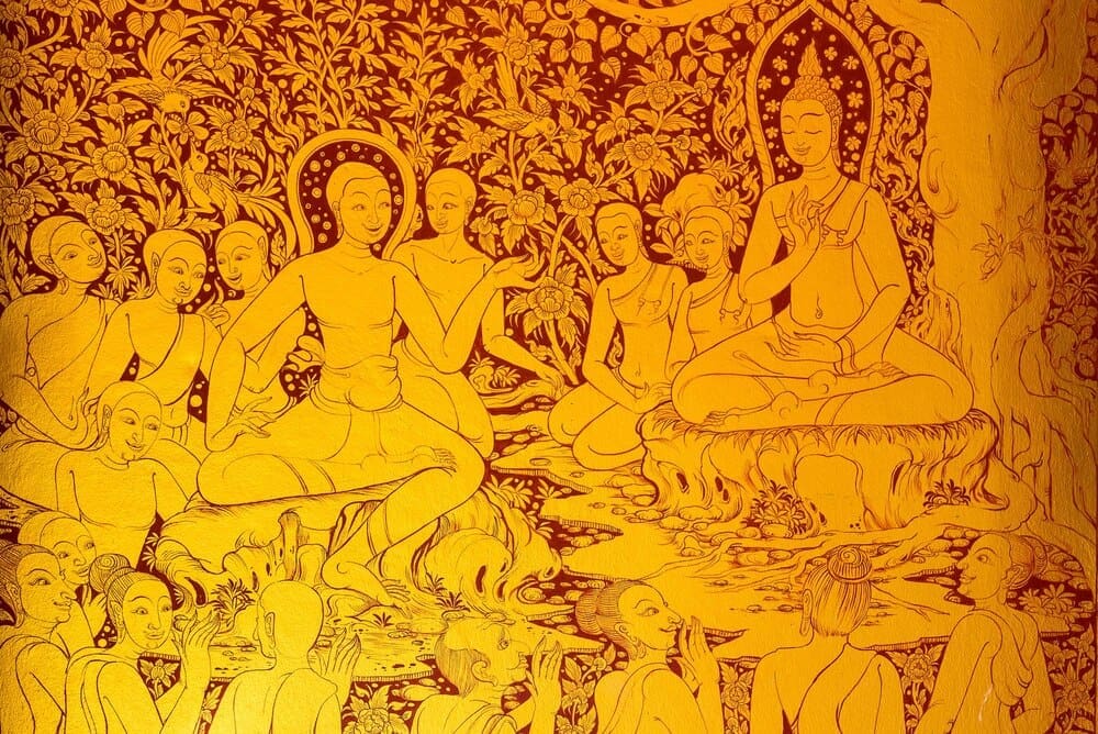 A yellow painting is displayed at a tilt on a wall.