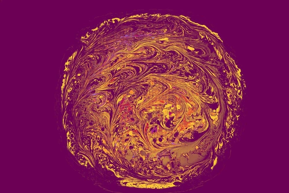Abstract patterns in traditional Ottoman Turkish marbling art, used as a background.