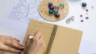 A woman, likely a numerologist or astrologer, is focused on counting numbers.