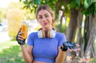 A young, attractive woman with blonde hair is smiling.