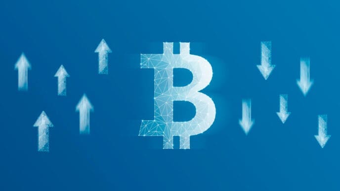 A digital graphic of a glowing, geometric Bitcoin symbol in the center, with a cluster of white arrows pointing upwards on the left and another cluster pointing downwards on the right.