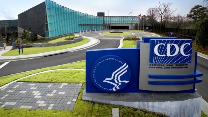 The entrance to the Tom Harkin Global Communications Center with a large sign for the CDC