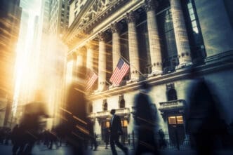 The New York Stock Exchange building facade with people walking in the foreground.
