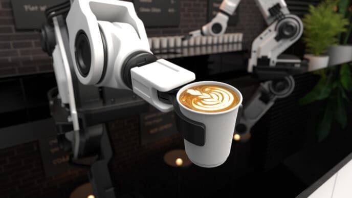 A robotic arm in a futuristic cafe is holding a coffee cup with a latte art design on top.