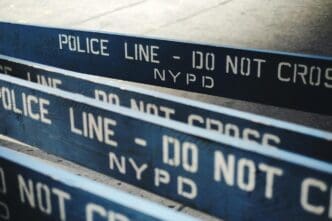 Barricades with text are set up on a street.