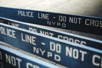 Barricades with text are set up on a street.